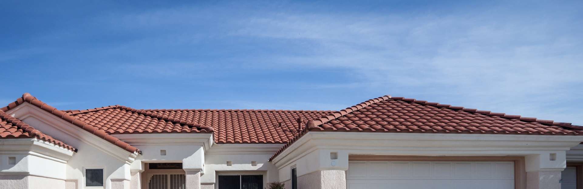 Diversified Roofing | residential house with red shingle roofing